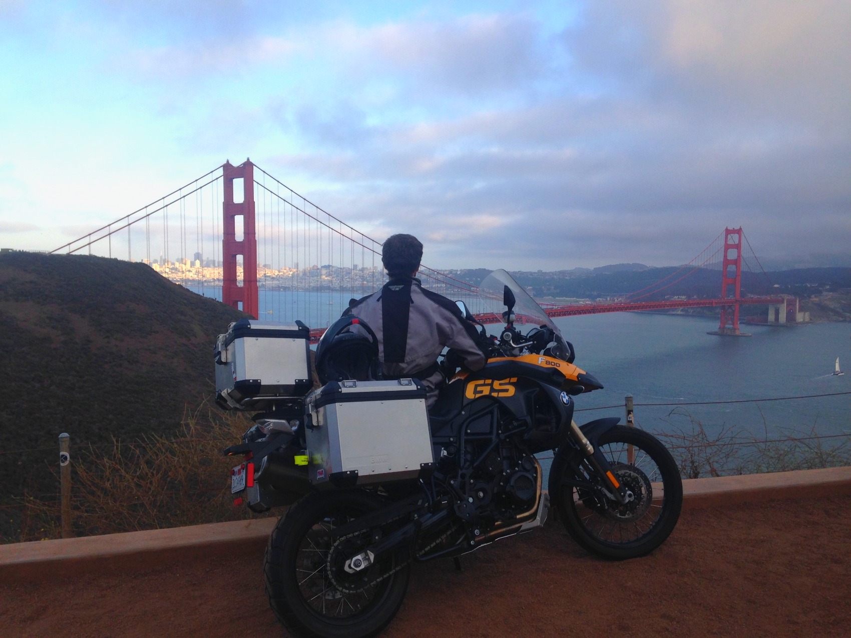 The motorcycle at a Marin Headlands viewpoint with the bridge behind