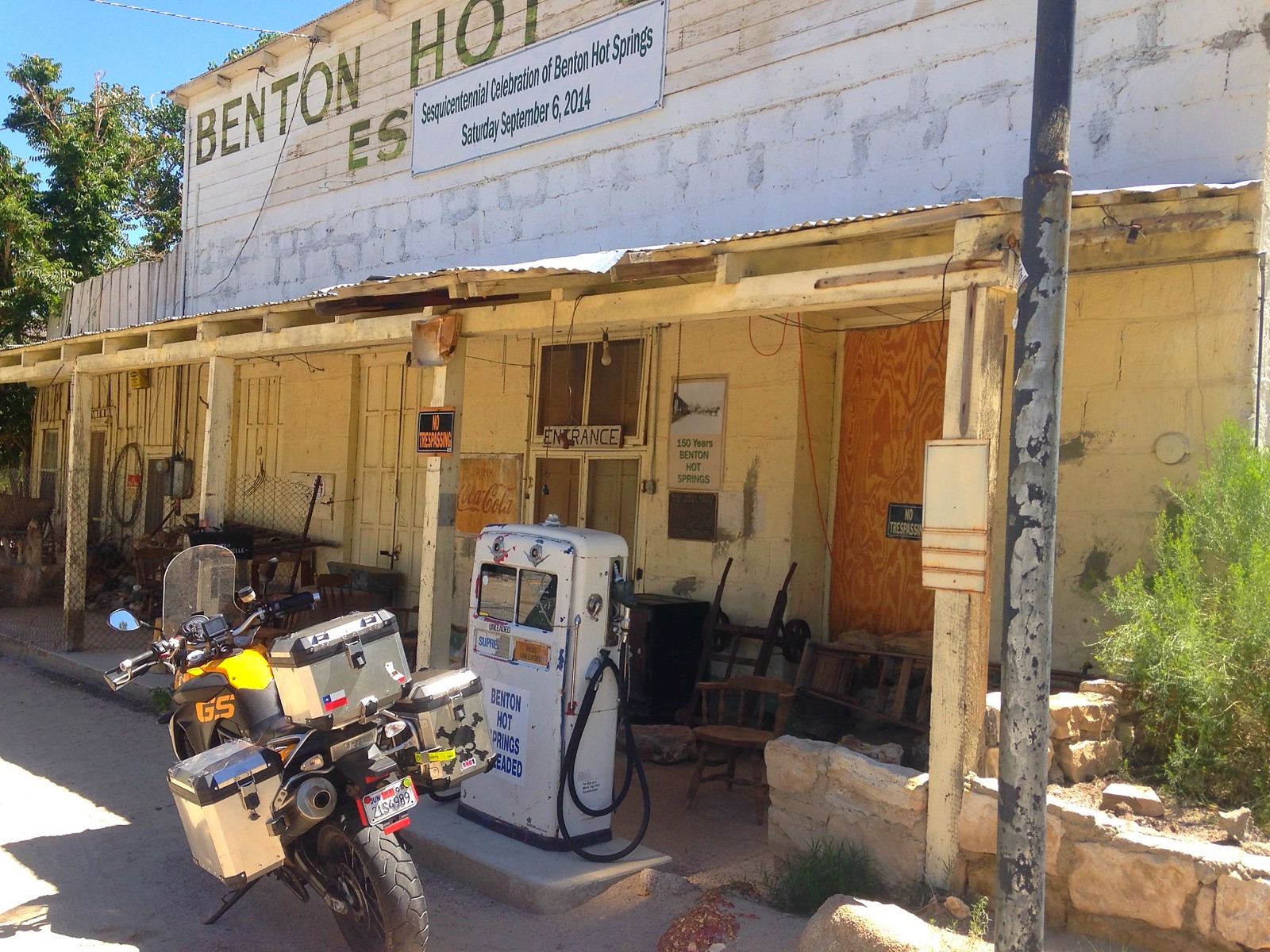 The motorcycle beside an old petrol pump at Benton Hot Springs