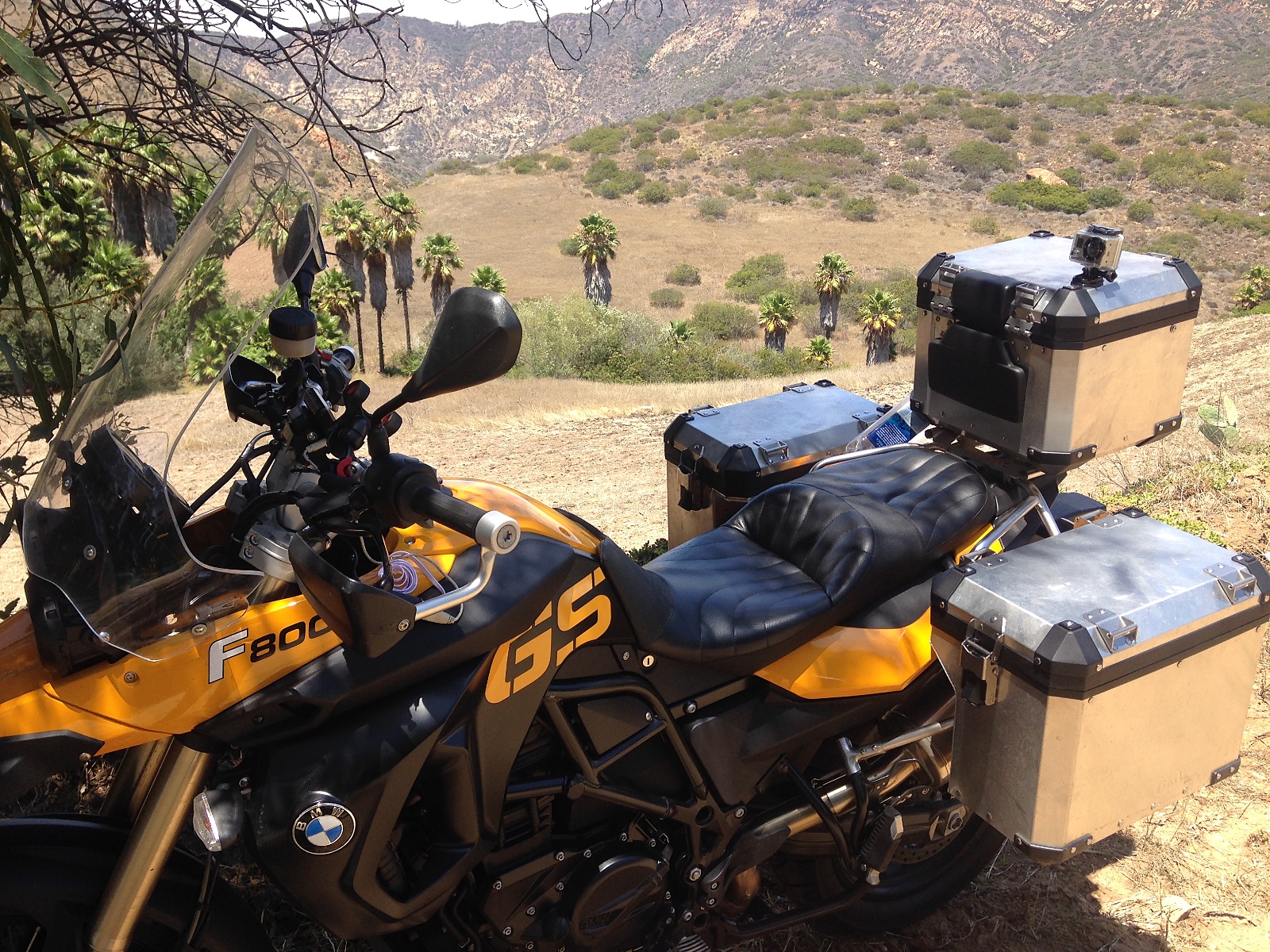 The loaded motorcycle in the dry hills