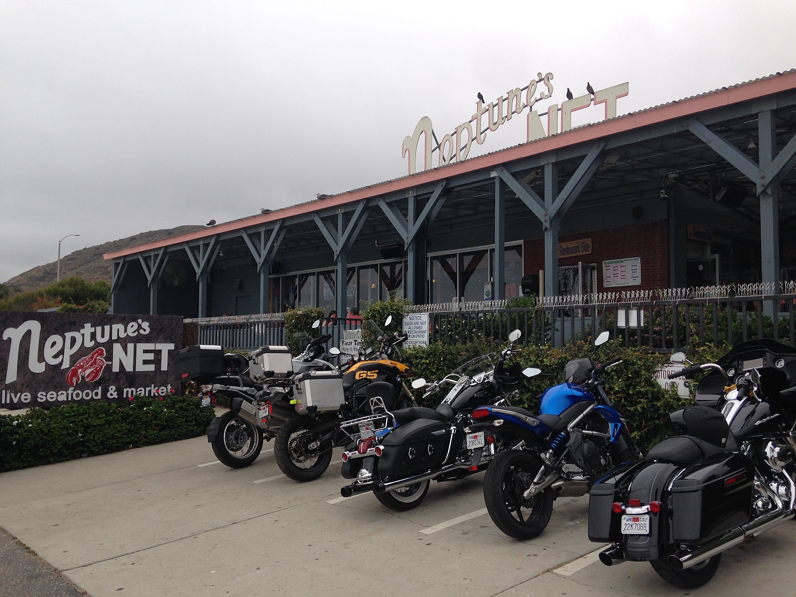 Motorcycles parked outside Neptune's Net on the Pacific Coast Highway