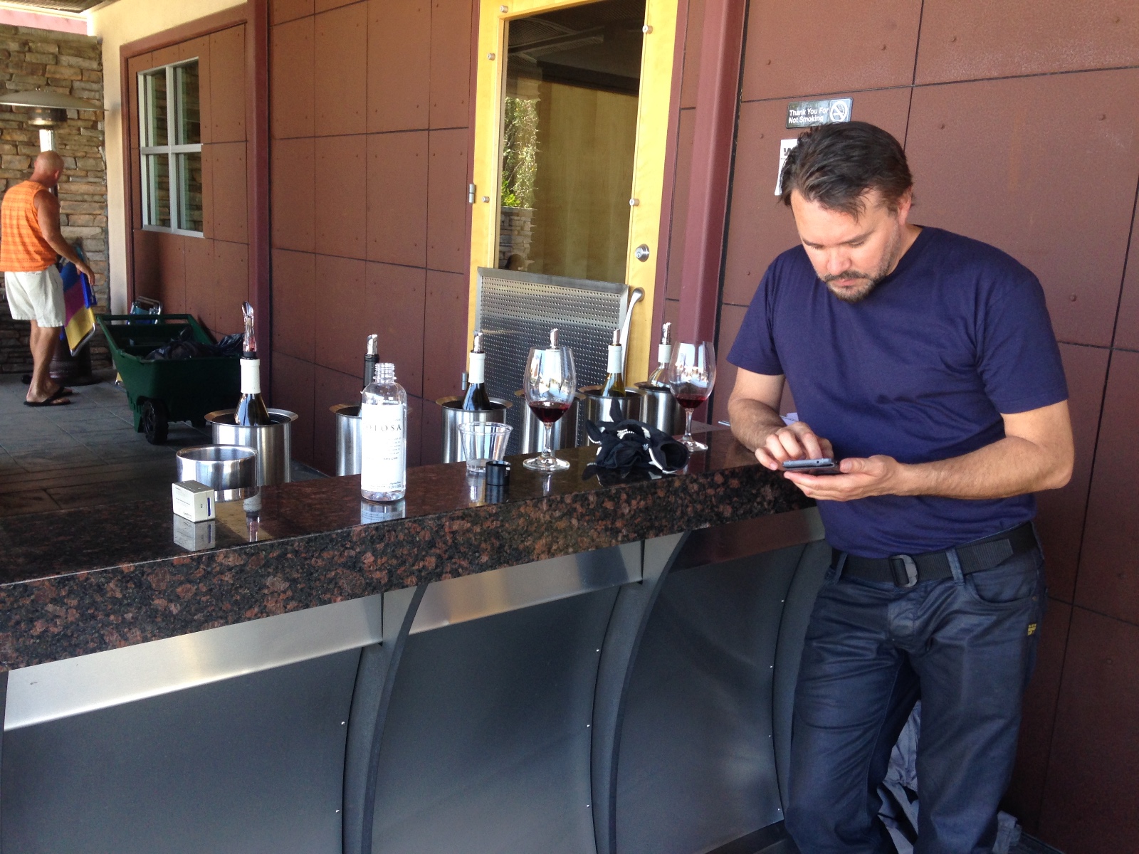 Randy at a winery tasting bar