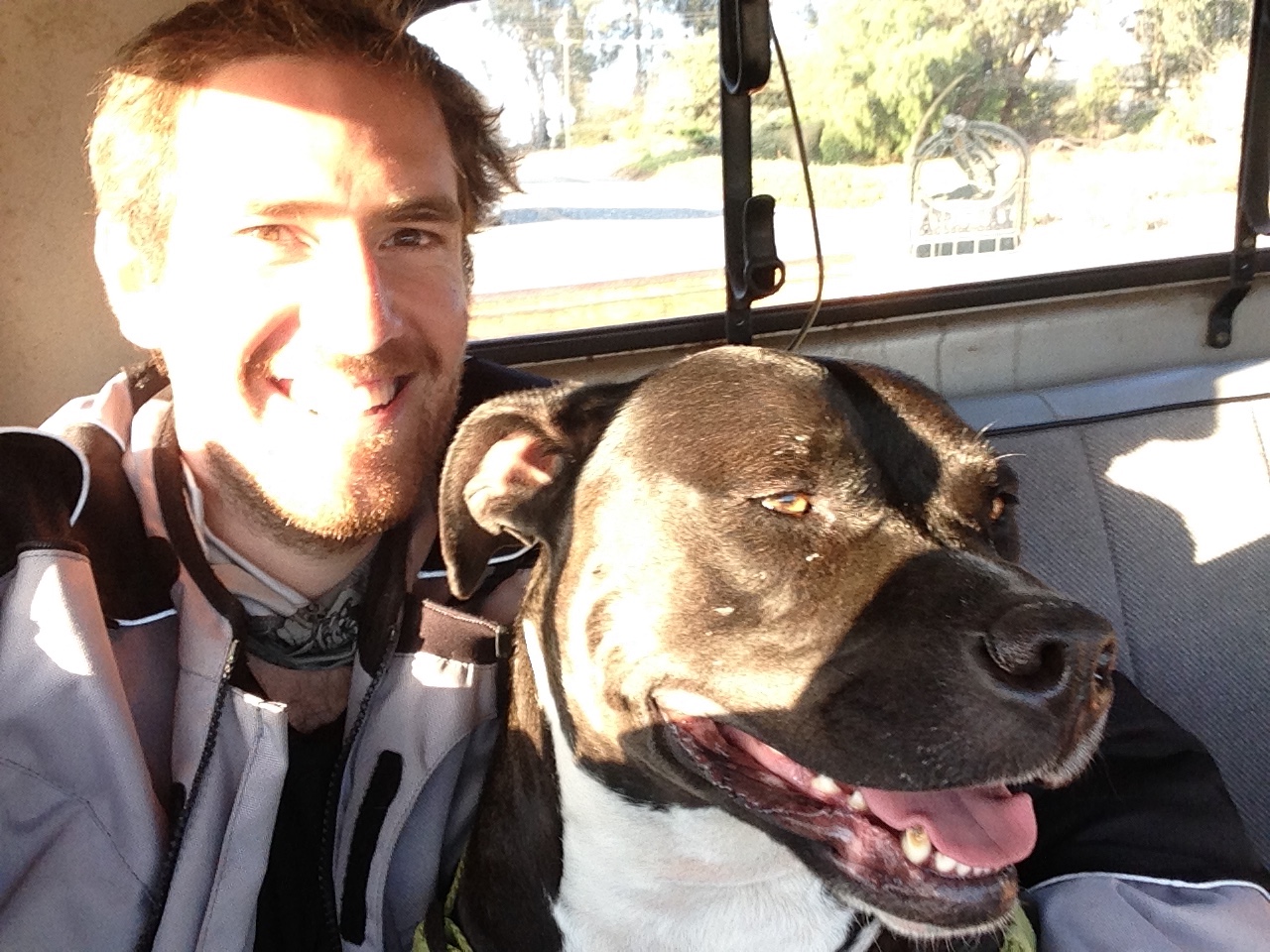 Rodrigo and a dog in a pickup truck
