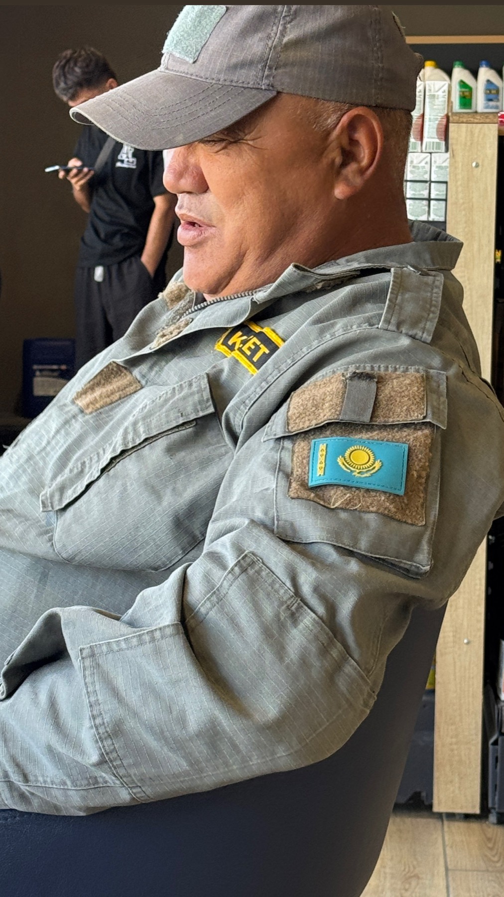 A Kazakh flag patch on the shoulder of a uniform