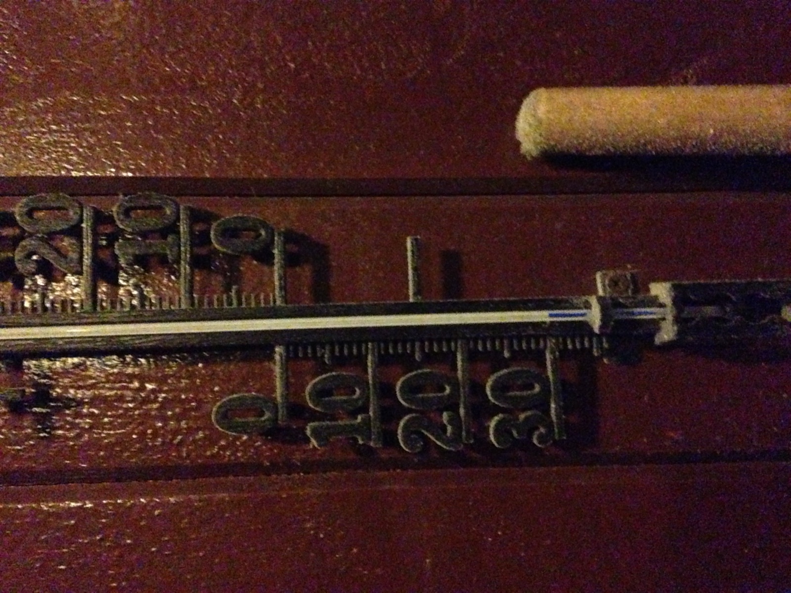 A frost-covered thermometer well below zero