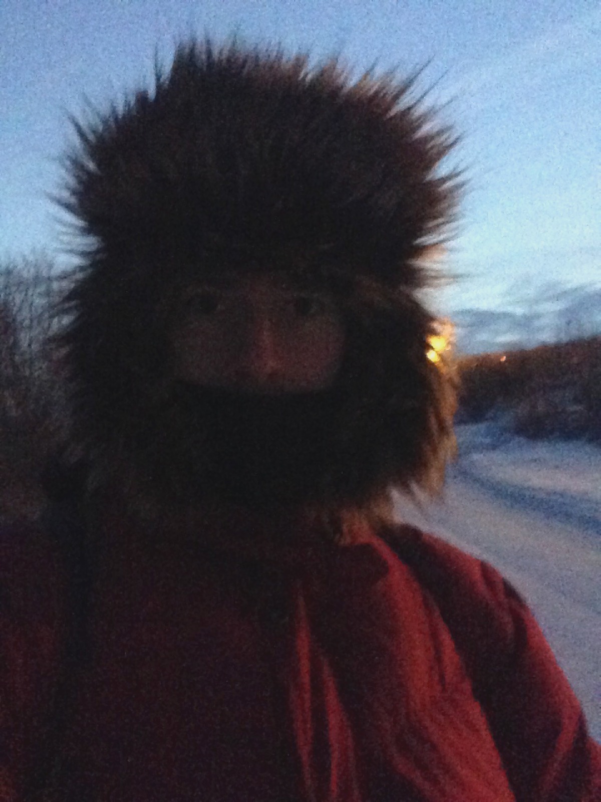Rodrigo covered to the eyes in a fur hat