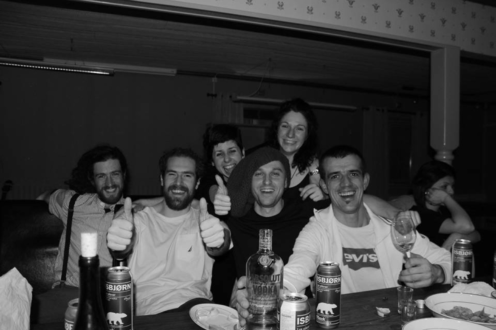 Colleagues around a table, laughing