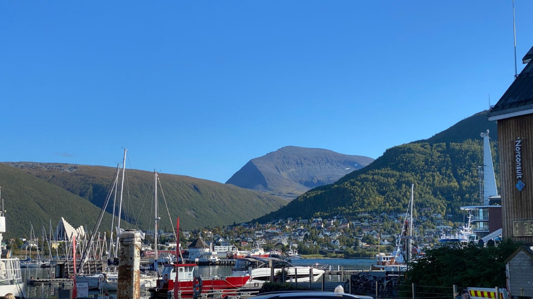 The harbour at Tromso with mountains behind