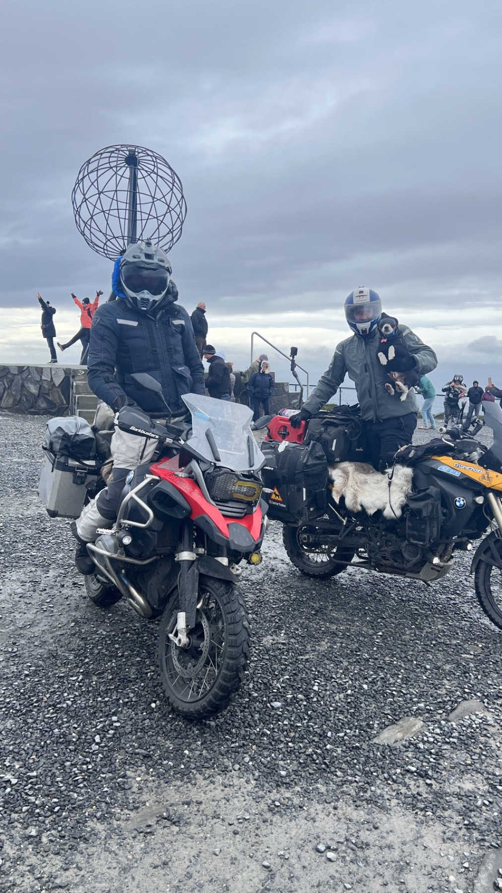 The motorcycles under a heavy grey sky