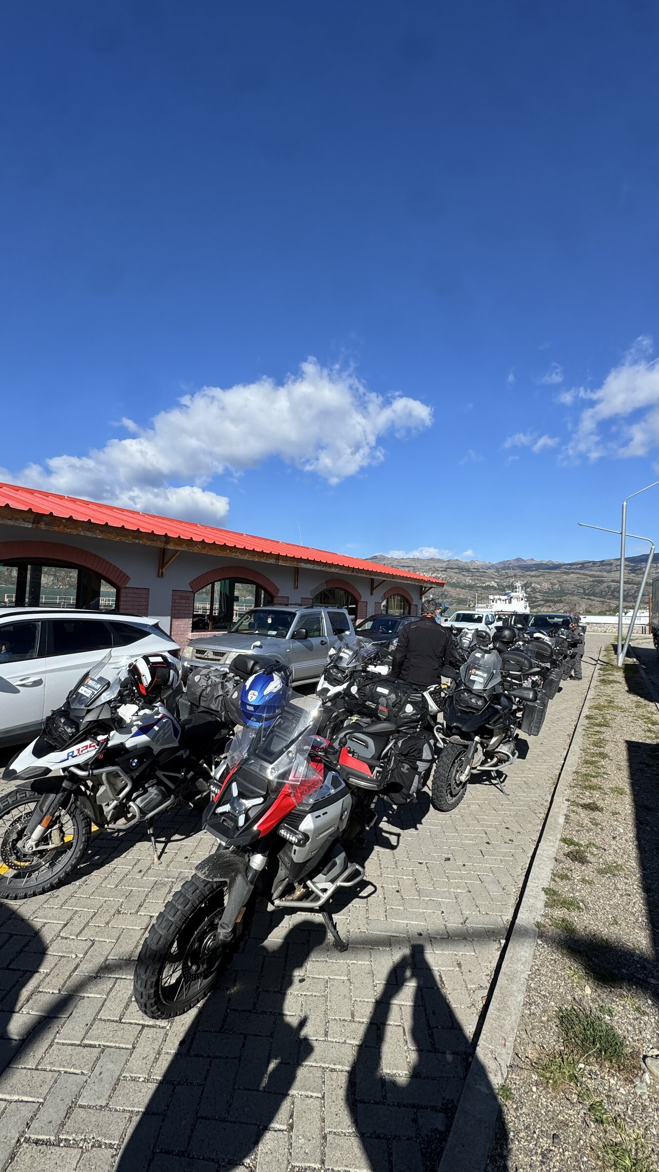 A line of expedition motorcycles ready to leave