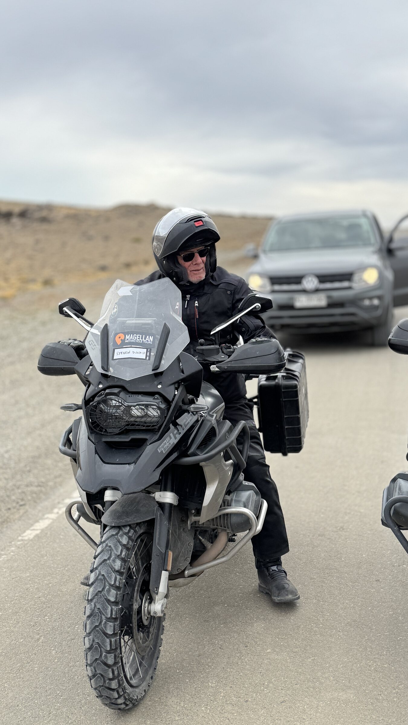 An expedition rider on a BMW adventure motorcycle