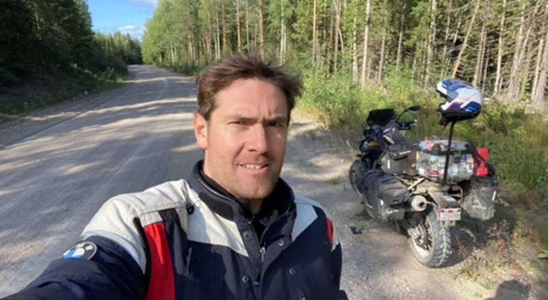 Rodrigo riding a forest road in Karelia