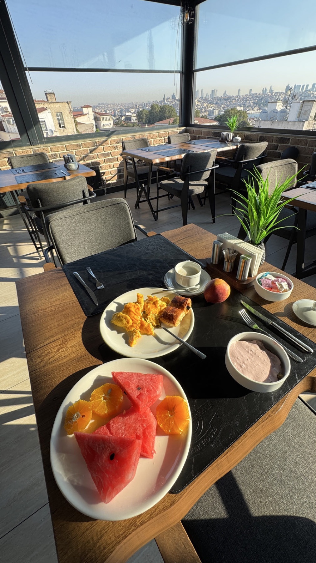 A hotel breakfast table looking out over Istanbul