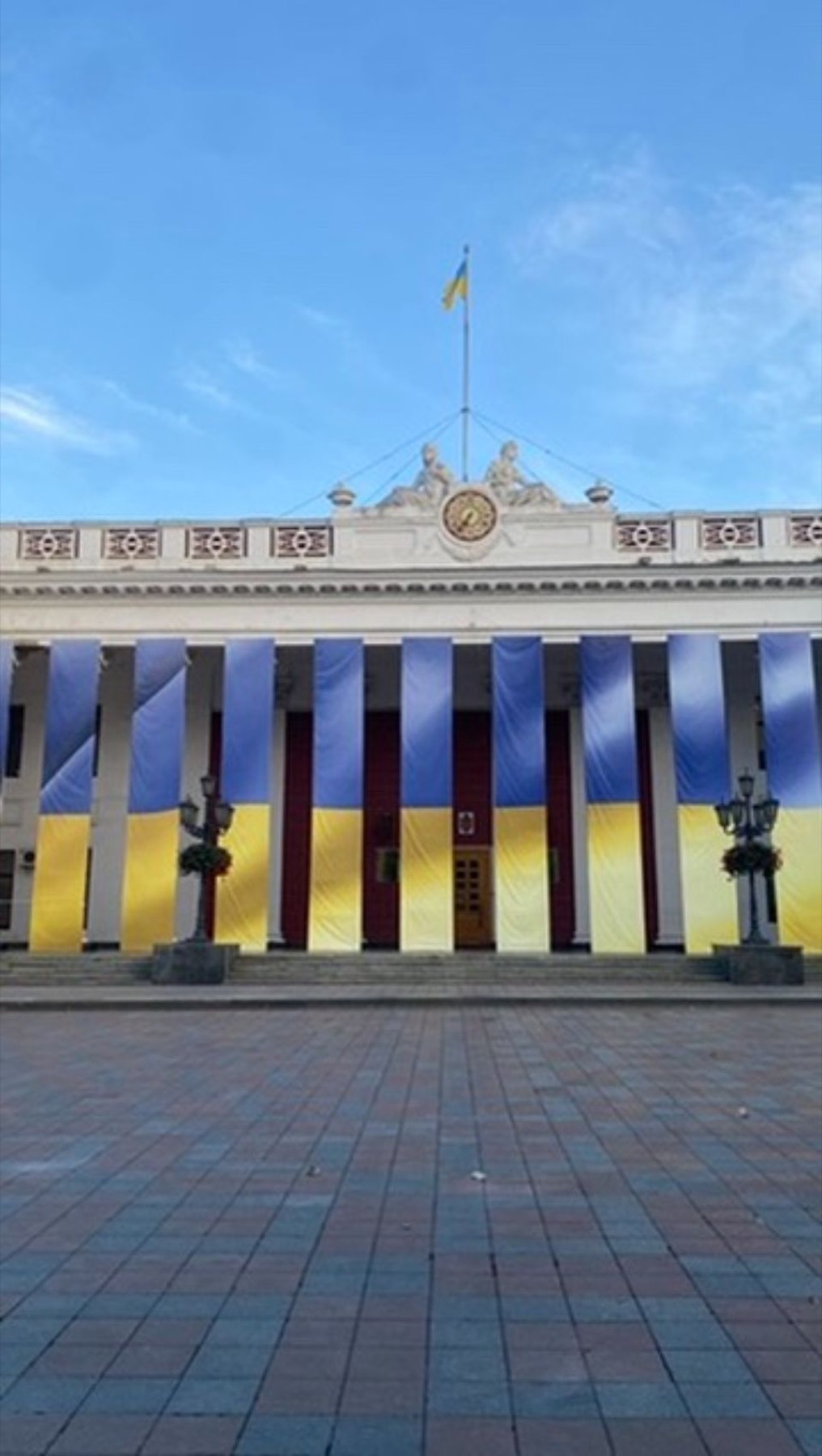 A square in Kyiv lined with Ukrainian flags