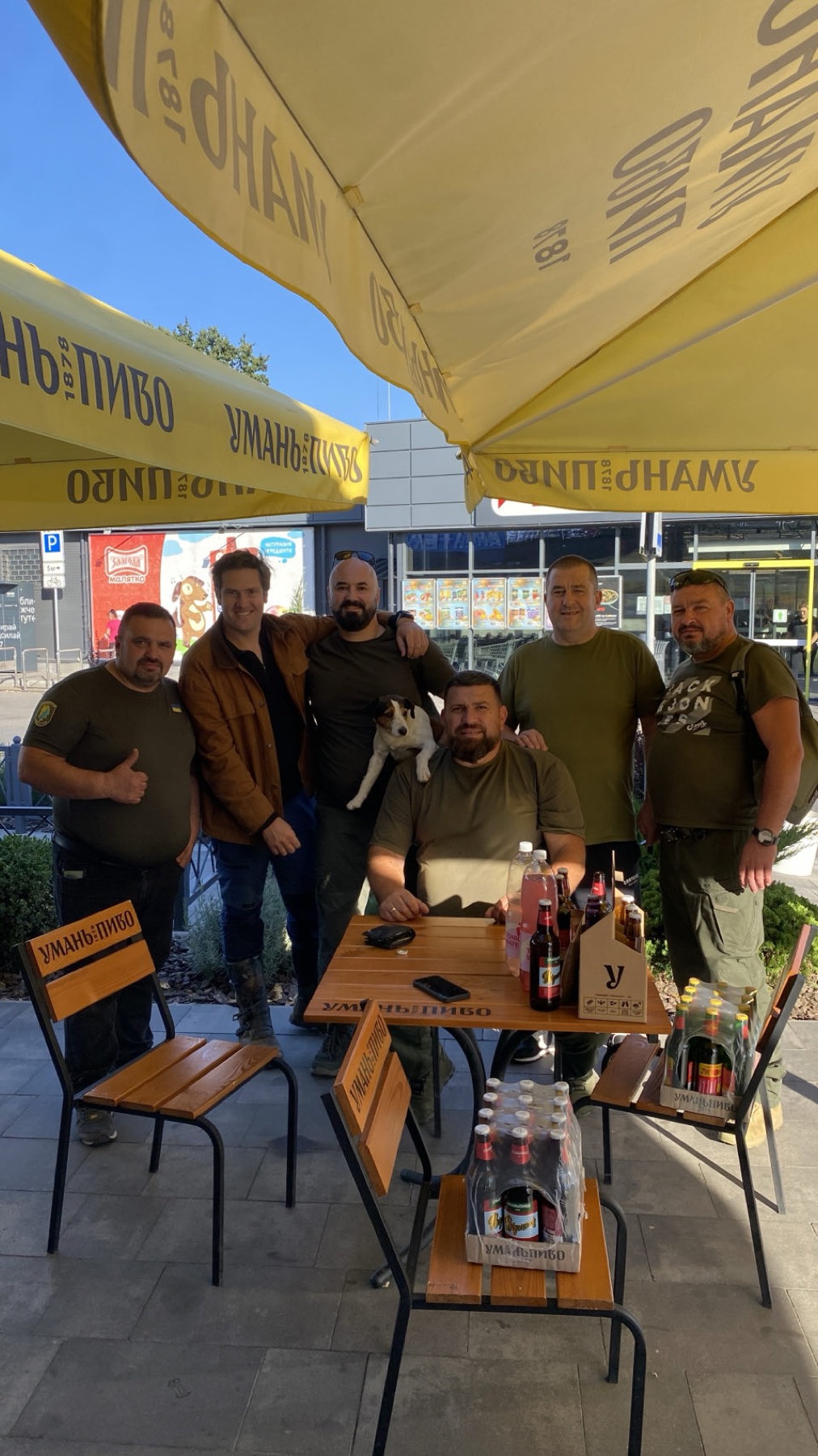 Rodrigo with a group at an outdoor table