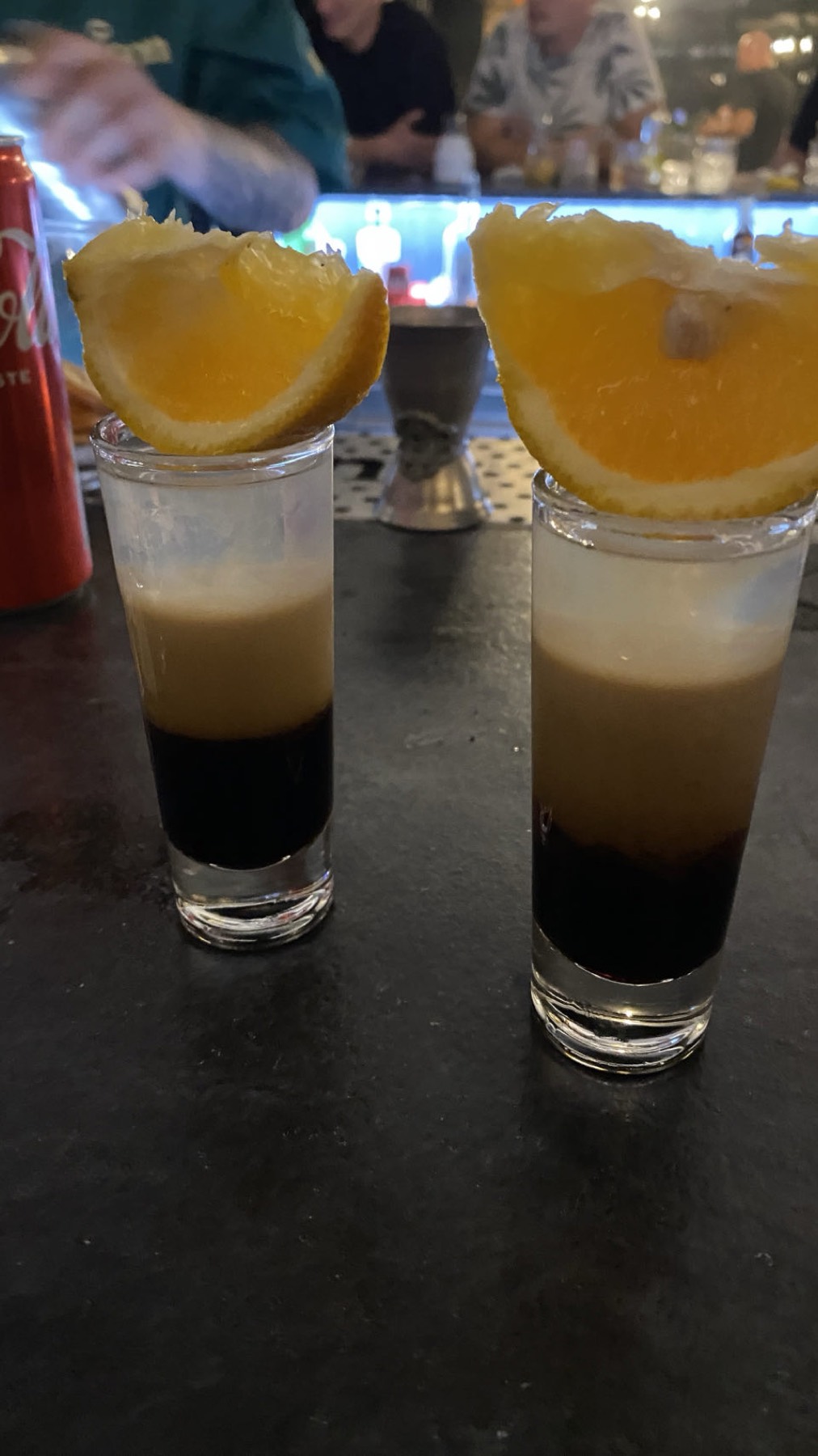 Two drinks on a bar counter
