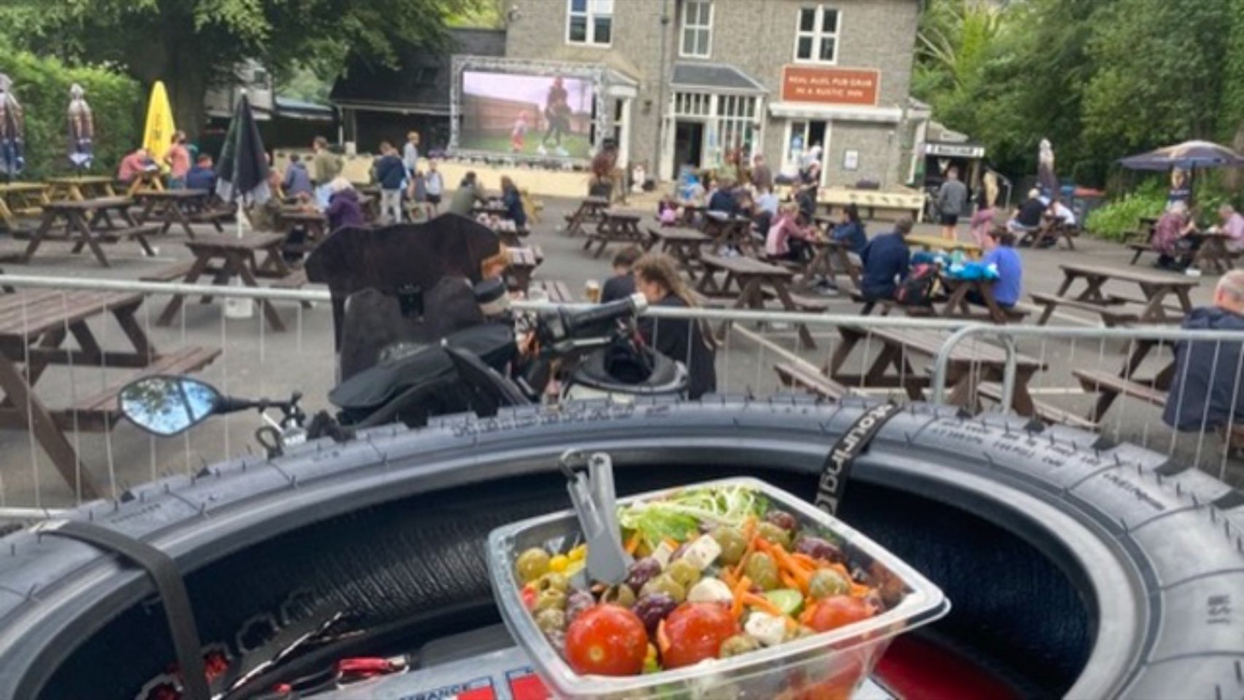 Motorcycles parked outside a pub at Llanberis